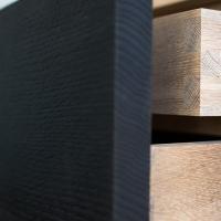Colin Parker Furniture black and natural wood drawer detail