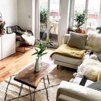 Sky High Design walnut live edge coffee table for a light and airy living room