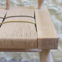 detail of woven seat windsor bench by petrel furniture